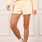 Cream sweat shorts