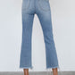 JEANS CROPPED DE TIRO ALTO CON CORTE DE BOTA