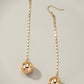 Long chain with dangling ball drop earrings