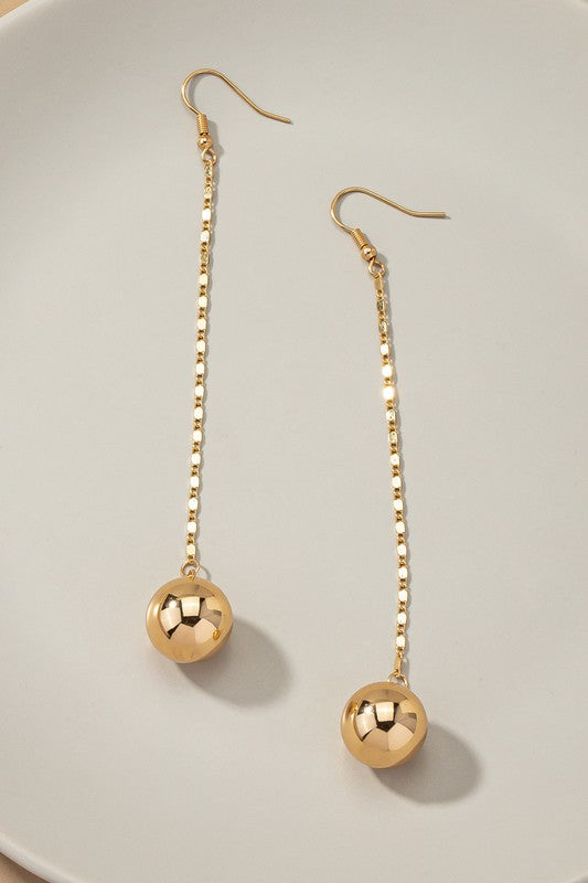 Long chain with dangling ball drop earrings