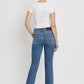 High Rise Slant Hem Flare Jeans