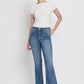 High Rise Slant Hem Flare Jeans