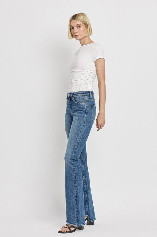 High Rise Slant Hem Flare Jeans