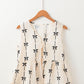 White Bow Printed Tie Closure Ruffled Vest