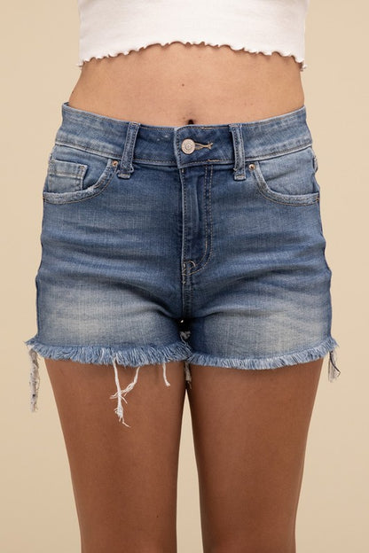 Shorts vaqueros de talle medio sin rematar con dobladillo deshilachado