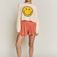 SMILEY FACE LONG SLEEVE CROP TOP